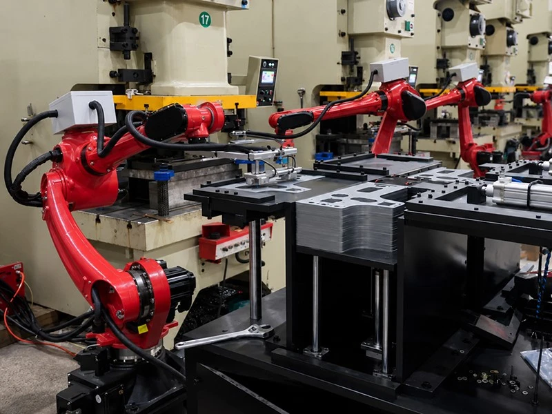 Robotic Stamping Line Tending Robotic Stamping Line Tending
